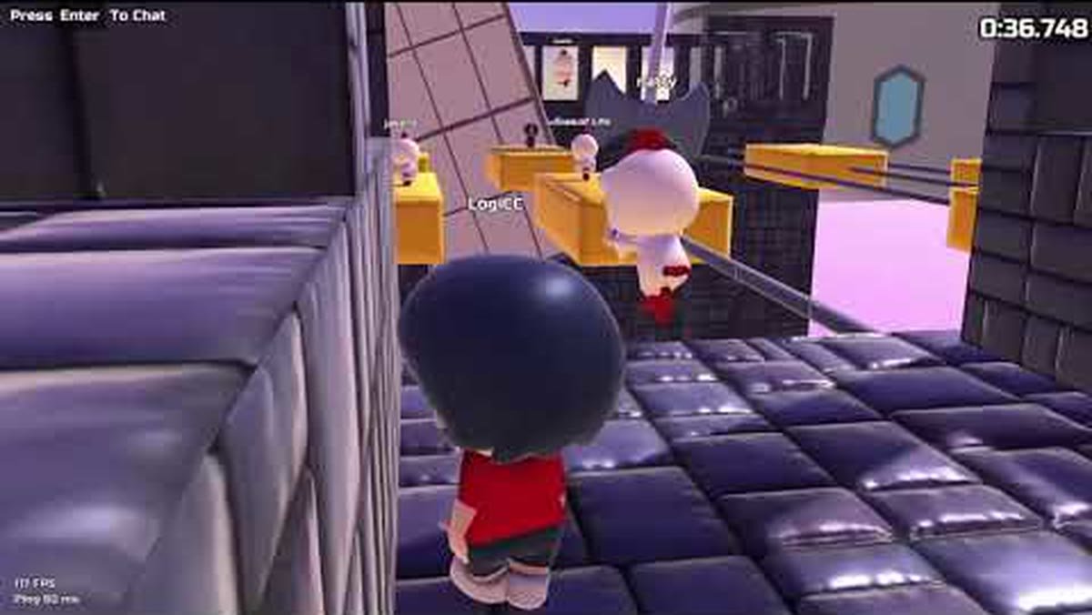 Double Jump gameplay with several players in a level, the in-game chat prompt visible.